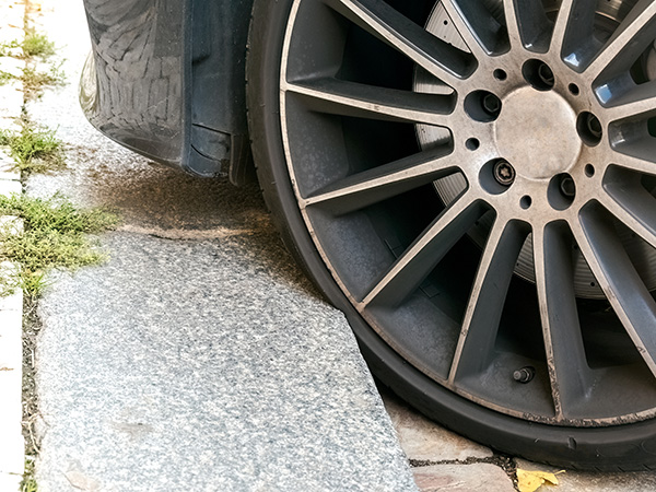 Is My Car Safe After Hitting a Curb or a Pothole? | Marc Yount's Tire Pros